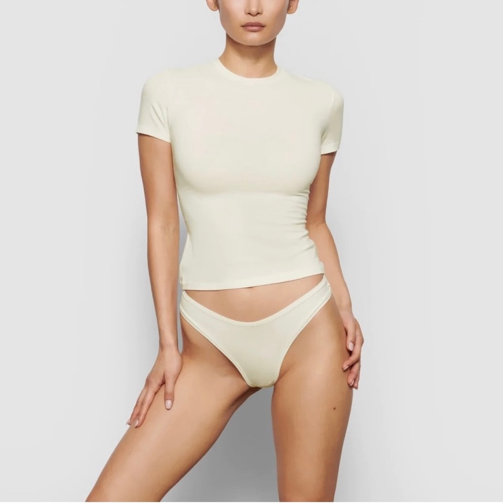 SKIMS COTTON JERSEY DIPPED THONG BONE SMALL